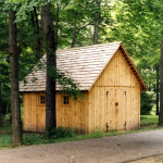 Garden shed with sawn siding and dear shake roof