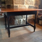 Tavern table with painted black under carriage and stained cherry top